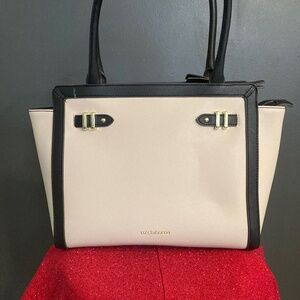 Designer purse, almost new, never used